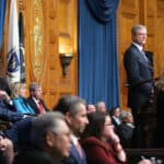 Dem Leaders Back Baker’s Climate Pledge, Stay Mum on Housing